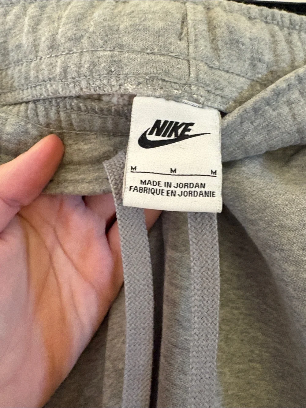 Nike men’s Light Grey Athletic Sweatpants with White Logo